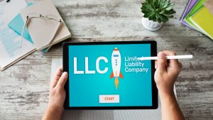 Business Owner Ordering LLC (Limited Liability Company) Formation online with tablet